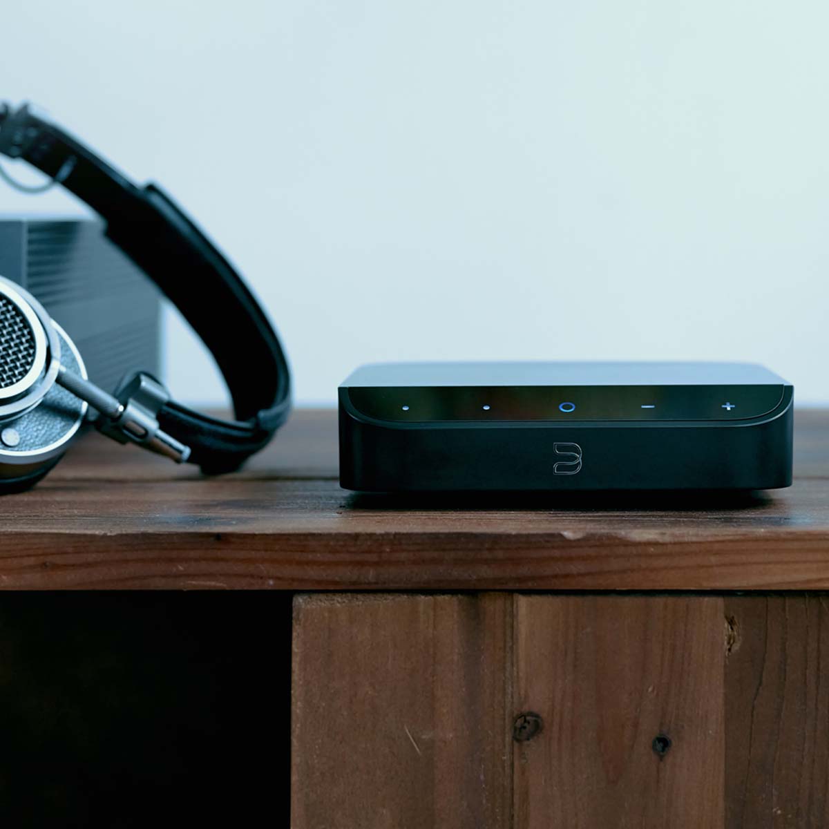 Bluesound NODE NANO Wireless Music Streamer with headphones