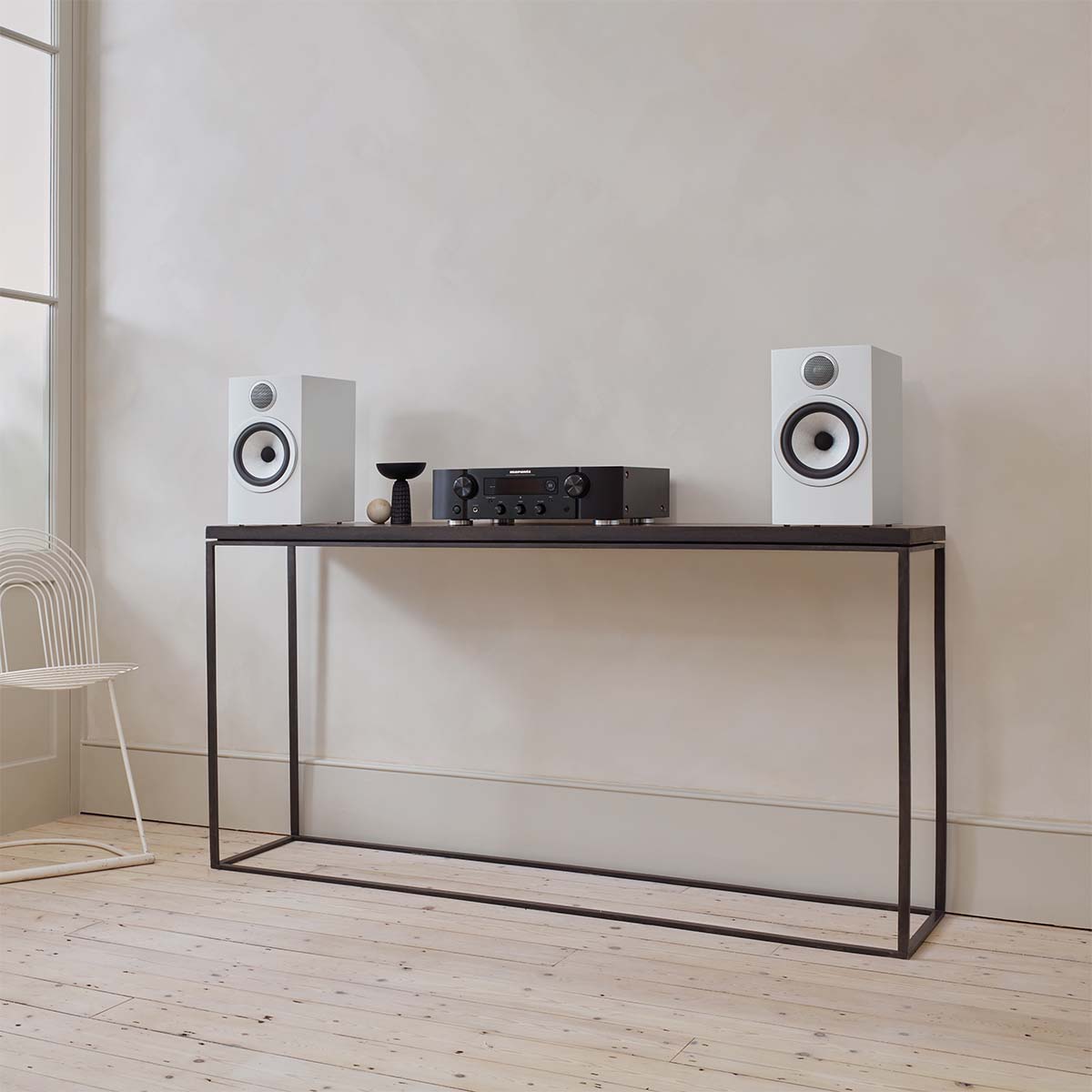 Bowers & Wilkins 706 S3 2-Way Stand Mount Bookshelf Loudspeakers on table with marantz amp