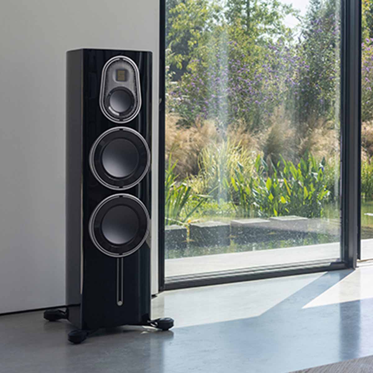 Monitor Audio Platinum 300 3G Floorstanding Loudspeaker - piano black next to window