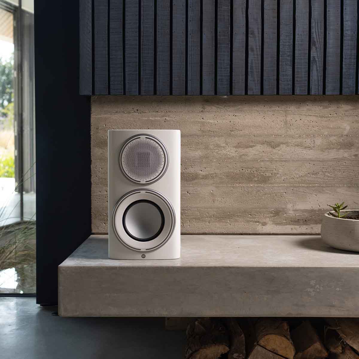 Monitor Audio Platinum 100 3G Bookshelf Loudspeaker - satin white speaker on mantle