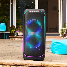 JBL PartyBox Ultimate speaker on a swimming pool deck