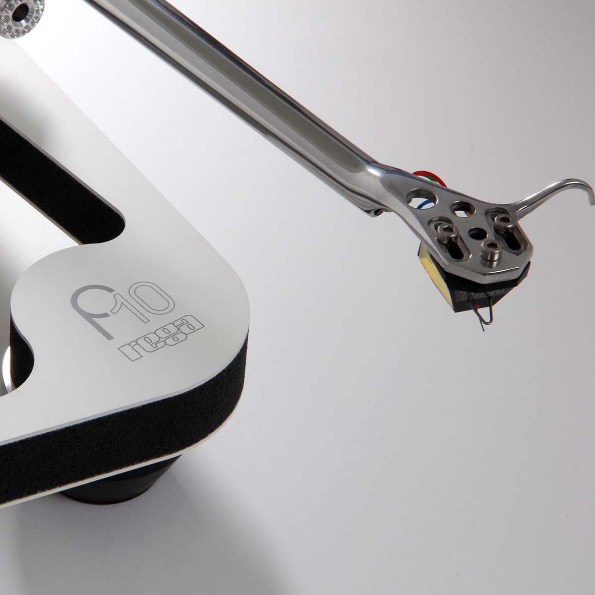 Detail view of plinth and arm on Rega Planar 10 in white