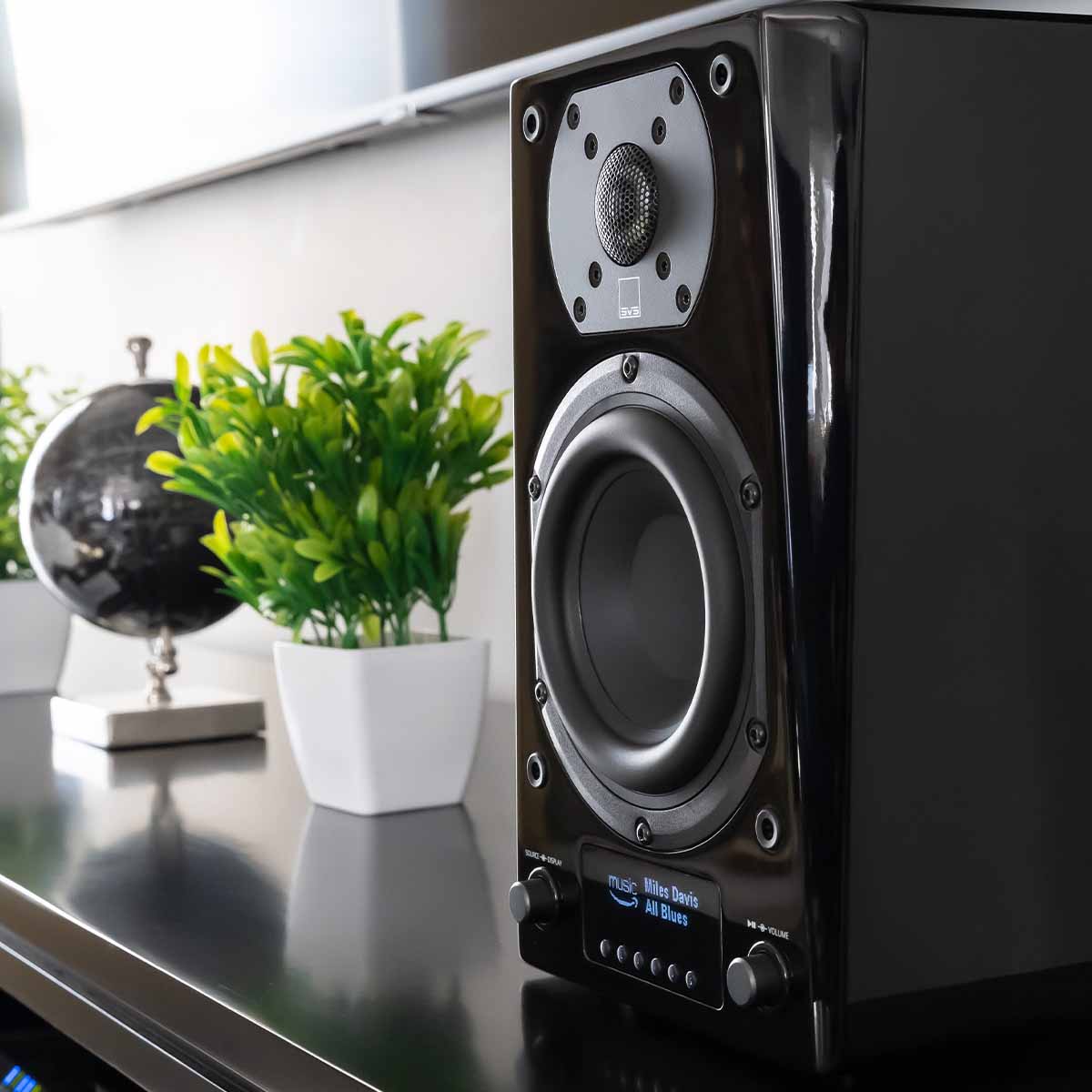 SVS Prime Wireless Pro Powered Speakers - Pair - on table with plant