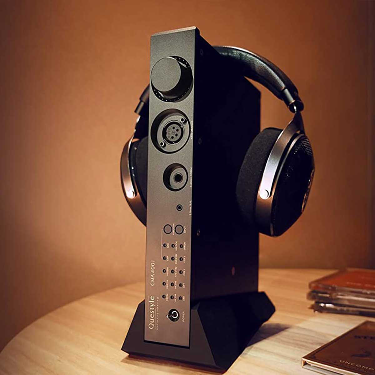 Lifestyle image of vertical stand for Questyle CMA 400i DAC