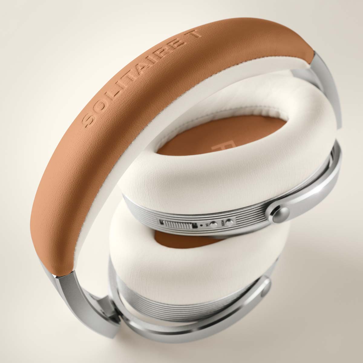 T+A Solitaire T High-Performance Closed-Back Dynamic Headphones - White - earphones folded in