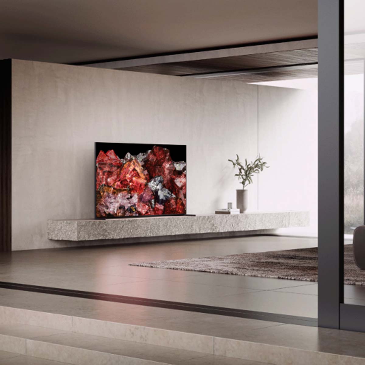 Sony Bravia XR X95L Mini LED HDR Smart TV (2023) on low mantle with plant
