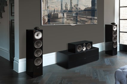 700 series set up in a living room with two tower speakers and center channel