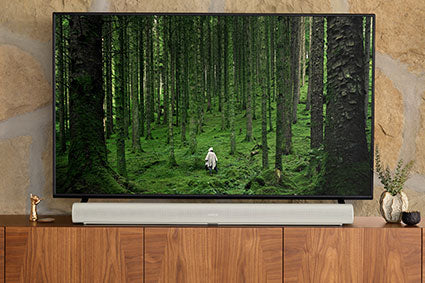 Sonos Arc Soundbar mounted below a television