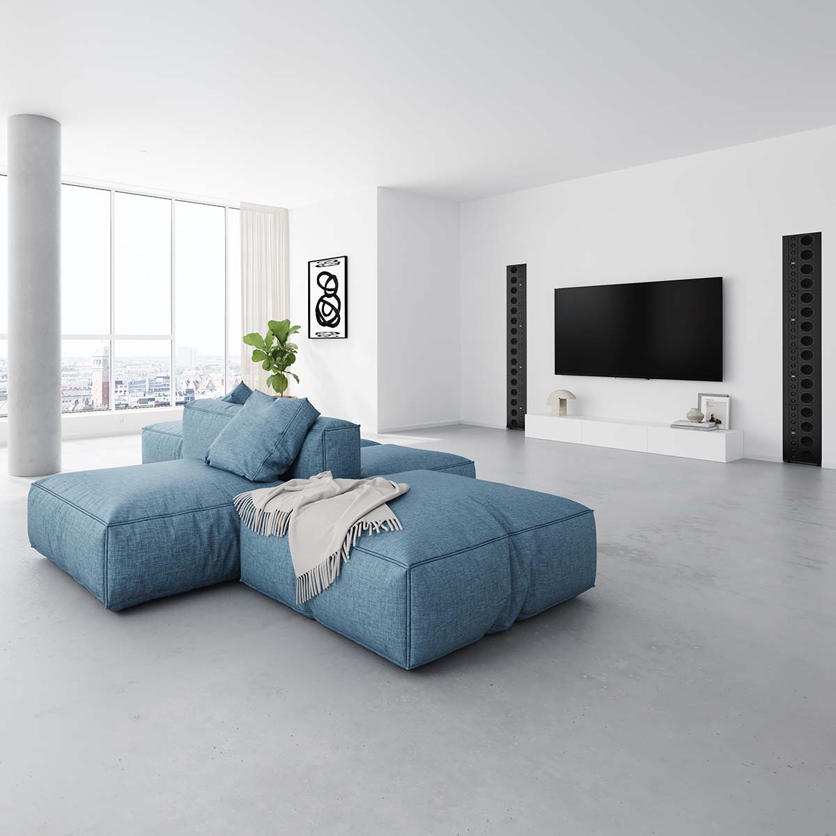 Lyngdorf LS-1000 Line Source Speaker lifestyle shot of units in wall to either side of TV