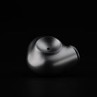 Meze Audio ASTRU Single Dynamic Driver In-Ear Monitors - artistic photo of sinlge earbud on black background