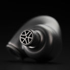 Meze Audio ASTRU Single Dynamic Driver In-Ear Monitors - artistic photo of single earbud on black background