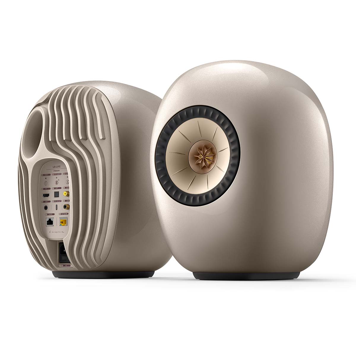 KEF LS Luxe Wireless HiFi Speakers - Pair of tan speakers angled left with left speaker showing back side