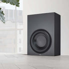 Lyngdorf BW-2 High Bandwidth Subwoofer lifestyle shot of black speaker front view angled left