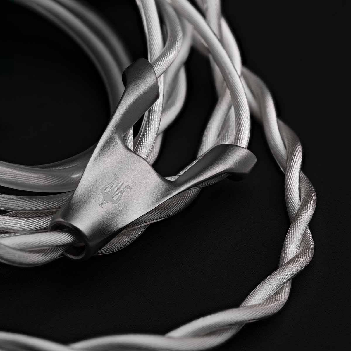 Meze Audio ASTRU Single Dynamic Driver In-Ear Monitors - artistic photo of coiled cable on black background