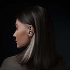 Meze Audio ASTRU Single Dynamic Driver In-Ear Monitors - woman looking left wearing earbud in left ear