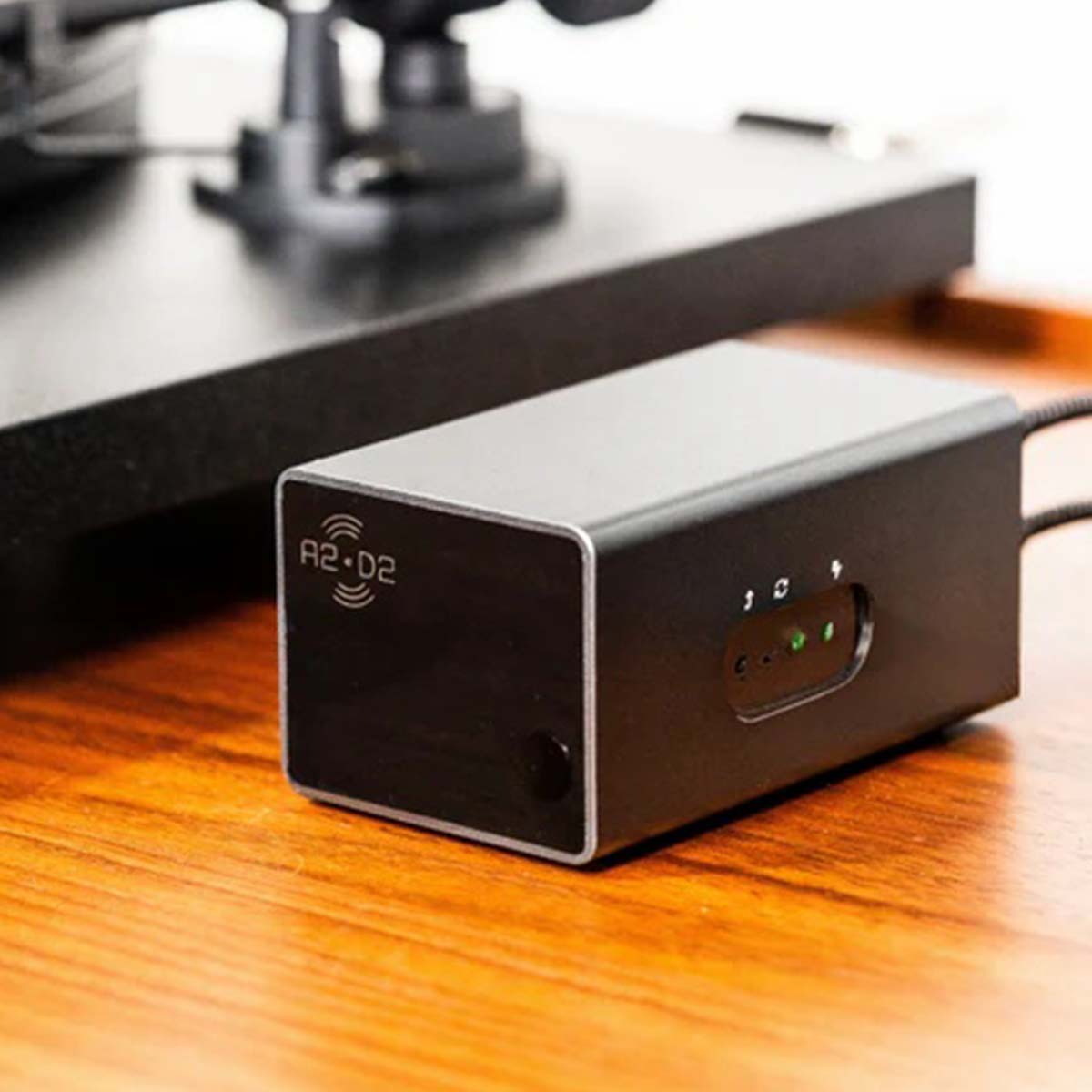 A2D2 Stream Analog-to-Digital Converter and Wi-Fi Streamer closeup on cabinet next to turntable