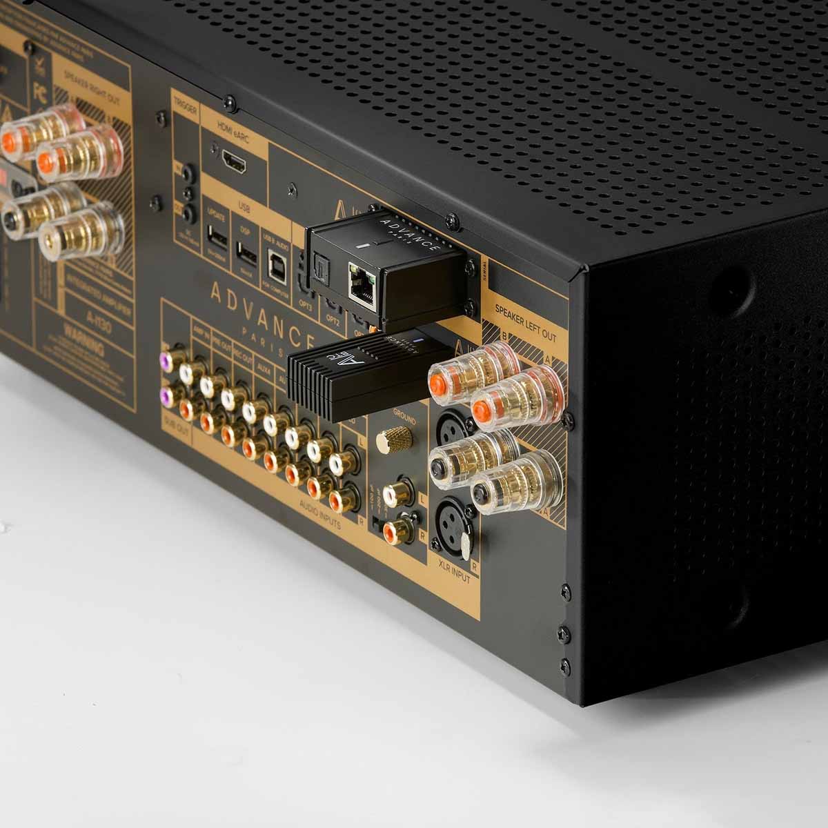 Advance Paris NOVA A-i130 Integrated Amplifier - Black - rear view angled left detail of separately sold dongles installed