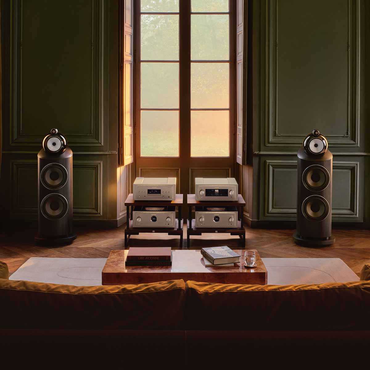 Bowers & Wilkins 801 D5 Floorstanding Loudspeaker - lifestyle photo of Light Walnut speakers without grilles in living room with hi-fi system in between