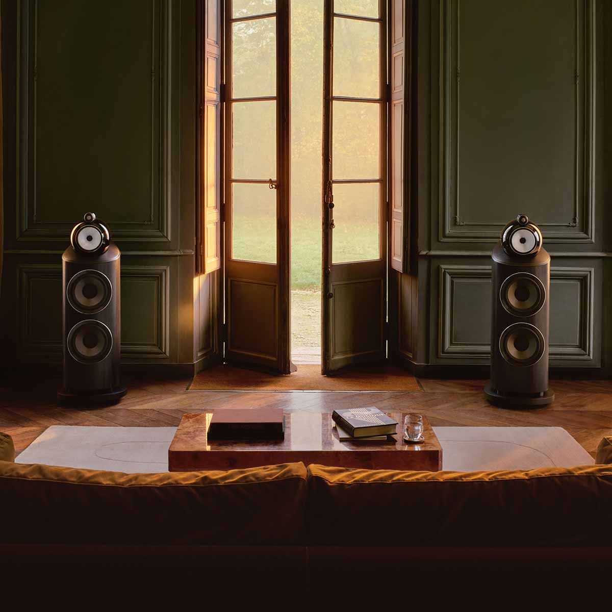 Bowers & Wilkins 801 D5 Floorstanding Loudspeaker - lifestyle photo of Light Walnut speakers without grilles in living room