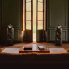 Bowers & Wilkins 801 D5 Floorstanding Loudspeaker - lifestyle photo of Light Walnut speakers without grilles in living room