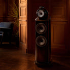 Bowers & Wilkins 803 D5 Floorstanding Loudspeaker - lifestyle photo front view of single Dark Walnut speaker without grilles