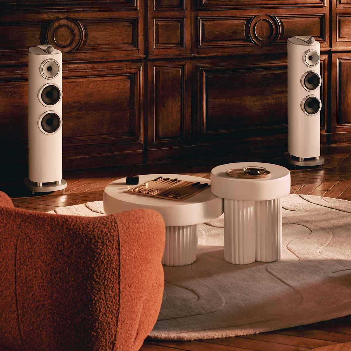 Bowers & Wilkins 804 D5 Floorstanding Loudspeaker - lifestyle photo of pair of Warm White speakers angled right in a living room