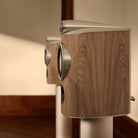 Bowers & Wilkins 805 D5 Bookshelf Loudspeaker - detail lifestyle photo of pair of Light Walnut speakers on stands without grilles facing left