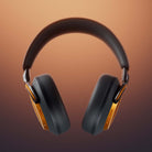 Bowers & Wilkins Px8 S2 McLaren Edition Wireless Over-Ear Headphones - rear view on orange background