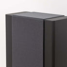 Lyngdorf FR-2 Speaker - closeup of top of black speaker with black grille