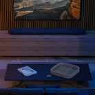 Bluesound Pulse Cinema Multi-Room Streaming Soundbar lifestyle photo of unit on cabinet under TV