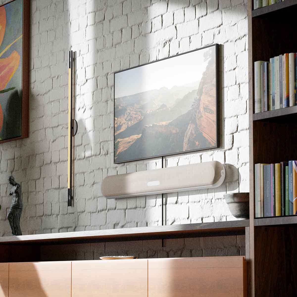 Bluesound Pulse Cinema Mini Multi-Room Streaming Soundbar Tan lifestyle photo of unit wall mounted below TV