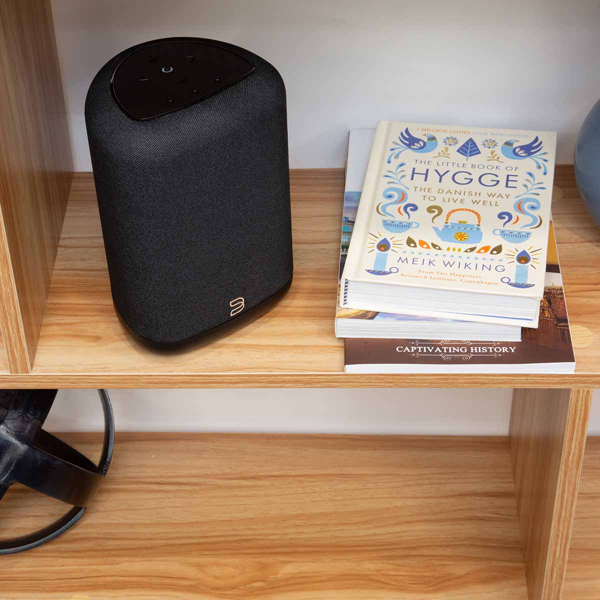 Bluesound Pulse Flex Wireless Multi-Room Music Streaming Speaker - Each - lifestyle photo black speaker on shelf