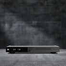 Lyngdorf CD-2 CD Player front view on dark gray background