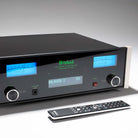 McIntosh CS7500 Streaming Preamplifier -  front view angled right with remote in front of unit