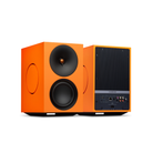 Front and back view of a pair of orange Cambridge Audio L/R X Advanced active stereo streaming speakers 