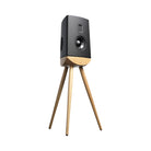 Lyngdorf Cue-100 Speaker black speaker with oak base front view angled right without grille