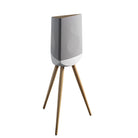 Lyngdorf Cue-100 Speaker with white base front view angled right with gray grille