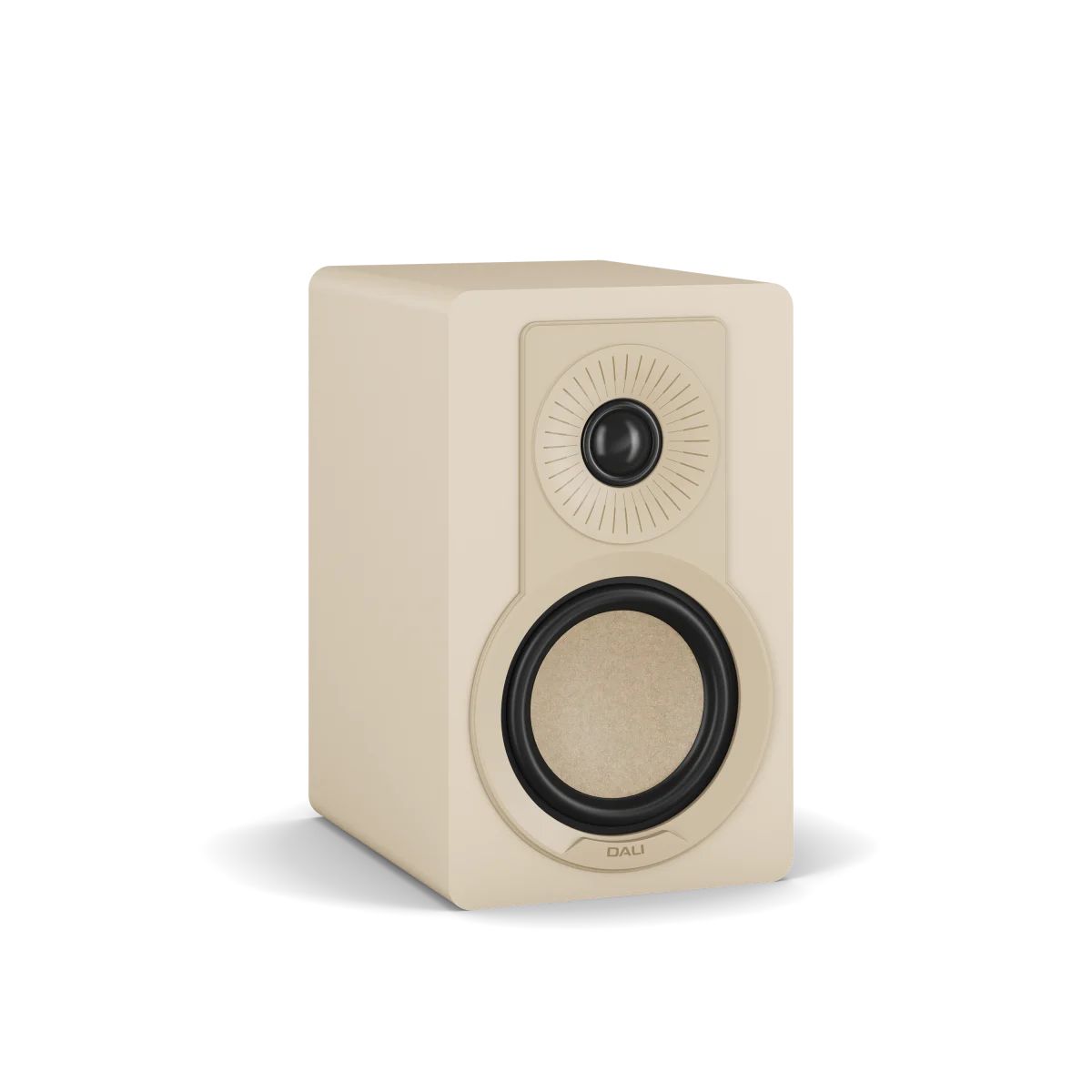 A single Dali KUPID bookshelf speaker in a warm cream-beige finish, featuring a large circular driver and a smaller circular tweeter on the front, set against a clean white background.