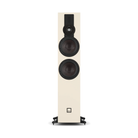 A tall, narrow Dali Sonik 7 floorstanding speaker in a warm cream or off-white finish with prominent black drivers and a small logo badge near the bottom, shown against a plain white background.