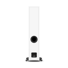 A tall, slim white Dali Sonik 7 floorstanding speaker shown from the rear, featuring a circular black driver and a square black port, standing on small black feet against a solid white background.