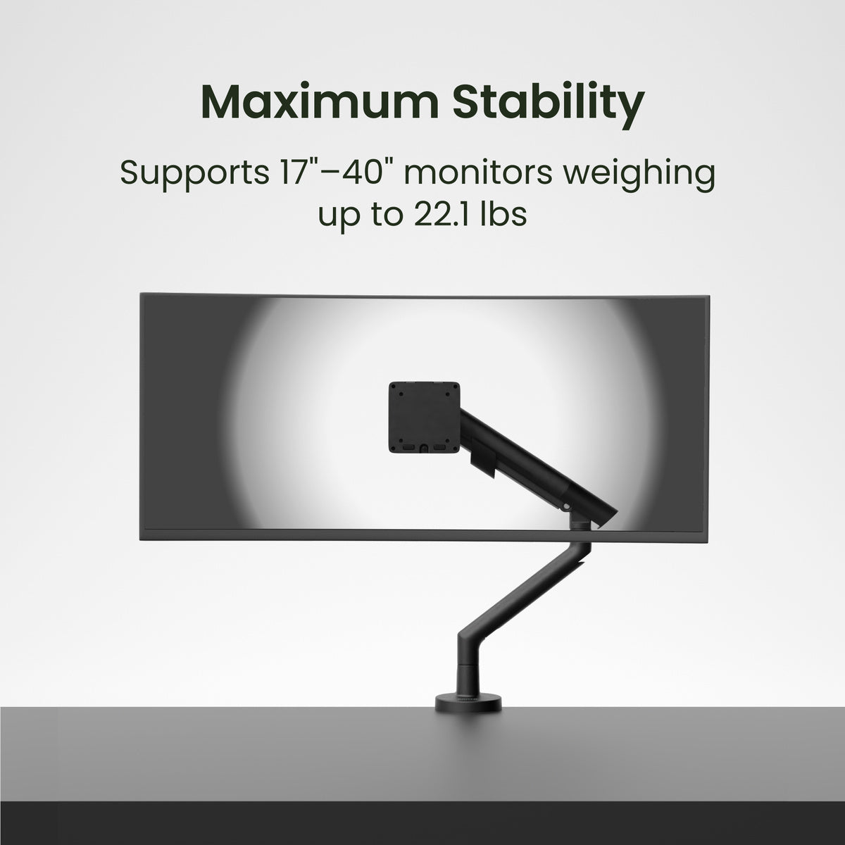 Monitor stand with text indicating support for 17"-40" monitors weighing up to 22.1 lbs on a light gray background.