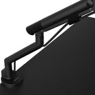 Black adjustable gym bench with 'Komo' branding on a white background