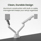 Two-monitor desk mount with built-in cable management on a gray background