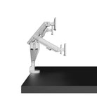 White adjustable monitor stand on a black platform with a white background