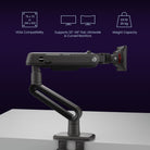 Black monitor stand with mounting options on a dark background