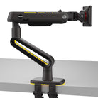 Black and yellow monitor arm on a white background