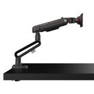Black adjustable monitor arm on a white background