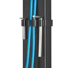 Black cable management system with blue and white cables on a white background