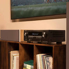 Denon AVR-S980H AV Receiver lifestyle photo of unit on cabinet