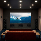 Lyngdorf D-60C In-Wall Speaker lifestyle view of units in wall in full theater room